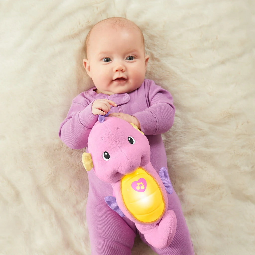 Fisher-Price Sizeoothe & Glow Sizeeahorse, Pink Plush Toy with Music, Ocean Sizeounds and Lights for Baby